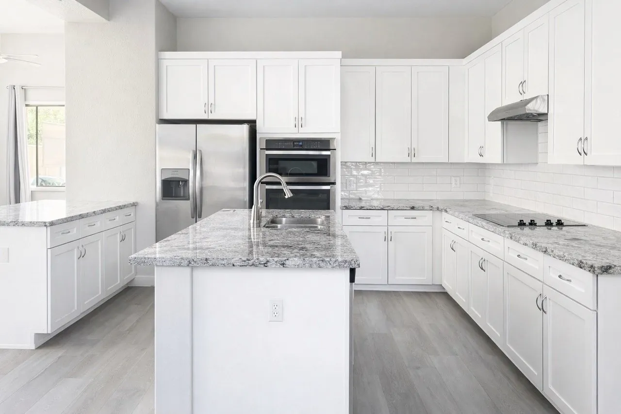 Mesa, AZ kitchen with granite countertops and a white subway tile backsplash, an RDC project